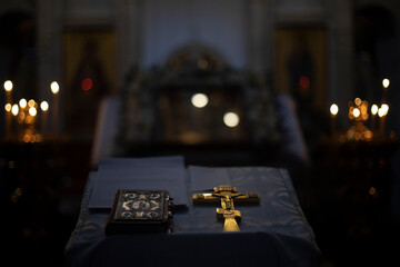 Cross in the Orthodox Church. Religious objects. The interior of the Temple. The Prayer Book and the Cross.