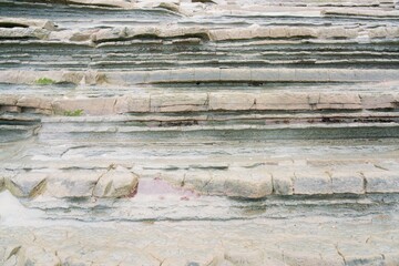 abstract layered rock formation, the Mataikona Rocks