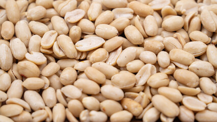 close up of a pile of peanuts
