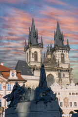 Fototapeta premium Summer sunrise view of the old town at the city center of Prague, Czech Republic, with Tyn Church and Astronomical Clock