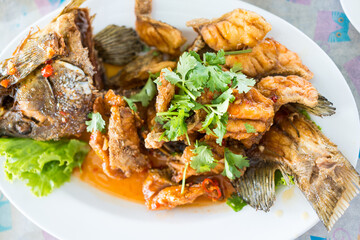 Thai style seafood, deep fried sea bass fish with sweet and sour tamarind sauce recipe