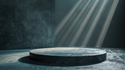 A large, empty stage with a spotlight shining on it