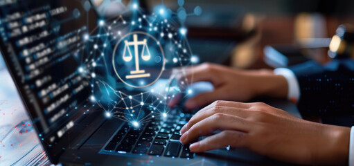 Hands typing on a laptop with holographic scales of justice symbol in a blurred background. Represents concepts of law, technology, legal research, and modern legal practices.