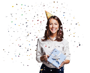 Happy woman with confetti falling everywhere on her isolated transparent PNG, Beautiful girl holding gift box, Birthday celebration party or New Year eve celebrating concept