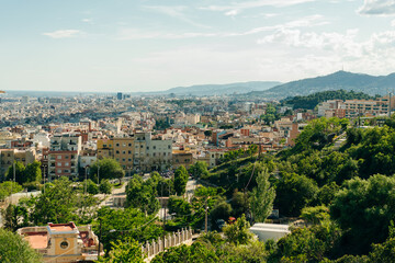 Fototapeta premium view of the city from the Bunkers del Carmel on a clear sky in Barcelona, Spain - may 2 2024
