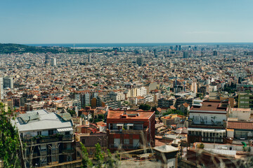  view of the city from the Bunkers del Carmel on a clear sky in Barcelona, Spain - may 2 2024