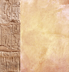 Vertical background with ancient Egyptian hieroglyphs on stone wall, Egypt, Africa. Backdrop with...
