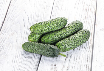 Fresh natural organic cucumbers heap