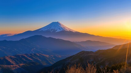 Fototapeta premium Breathtaking view of majestic mountain during sunset, with vibrant colors illuminating the serene landscape.