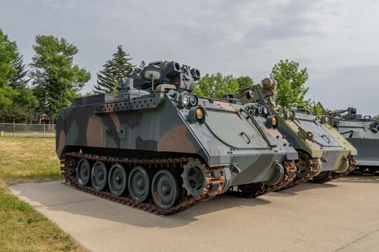Calgary, Alberta, Canada. Jul 26, 2024. An M113 armored personnel carrier (APC) with a distinctive turret and additional armor plating. The M901, often used for anti-tank roles.