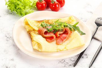 Russian pancake with salmon fish