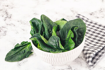 Ripe green spinach leaves heap