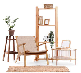Cozy armchair, houseplant and shelving unit isolated on white background