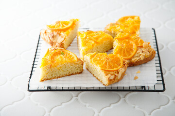Homemade vanilla cake with candied orange