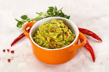 Guacamole with avocado, tomato and chili
