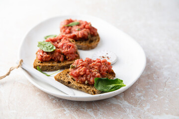 Traditional steak tartare on toast