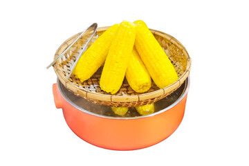 Isolated bright yellow corn cobs atop vibrant orange pot on transparent background, showcasing classic and healthy snack. Street food concept