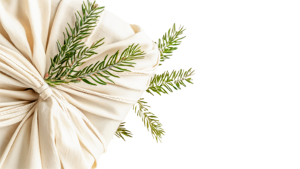 Isolated eco-friendly Christmas gift wrapped in fabric with an evergreen sprig, set against transparent background. Perfect for sustainable holiday wrapping ideas and green living inspiration