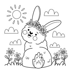 A cheerful rabbit sitting in a meadow © ukasz
