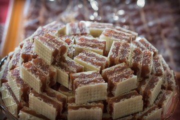 A closeup of a bunch of tasty homemade kitnikez cookies on a plate
