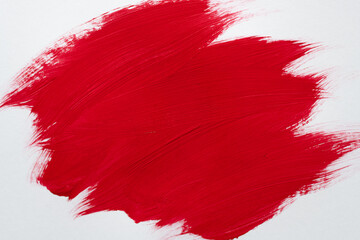 赤色の絵具を塗った背景