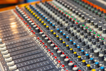Closeup of audio mixer control panel