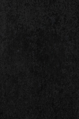 rough black paper, patterned dark paper surface.