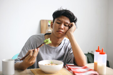 Asian Man Has No Appetite To Eat