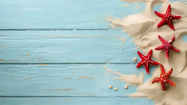 A light blue wooden background with white sand and red starfish, creating an ocean-inspired summer concept, backdrop perfect for  products or featuring graphic design coastal themes