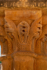 Close-up of intricate sculptures on a column at Monasterio de San Juan de Duero in Soria, Spain....