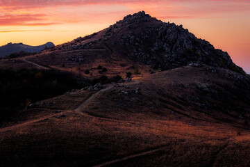 Sunrise over the ancient landscape of Macin Mountains