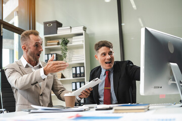 Group of International team of businessmen creative businesspeople coworker in office Happy to be successful partnership teamwork success concept.