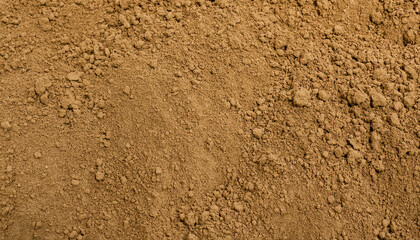 Closeup of light brown fertile soil texture