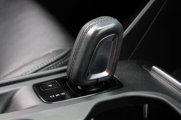 Close up car automatic transmission. Gear shift in new electric car. Selector automatic...