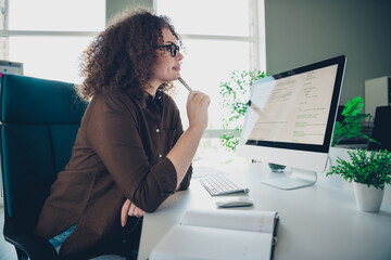 Photo of lovely charming successful woman sit chair work business coworking space workstation office indoors