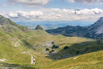 Majestic summer day in the Durmitor National park. Village Zabljak, Montenegro, Balkans, Europe. Scenic image of popular travel destination. Discover the beauty of earth. Hiking nature destination