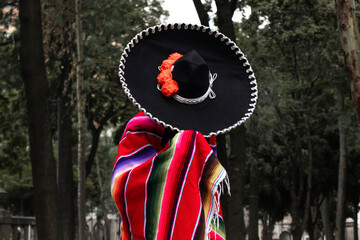 Catrin in traditional attire celebrating Day of the Dead