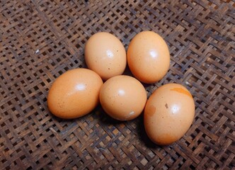 Chicken eggs on a basket.Fresh chicken eggs