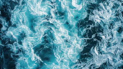 Naklejka premium Aerial view of an ocean with turbulent waters