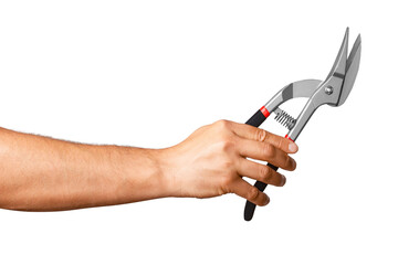 metal scissors in a man's hand on a blank background.