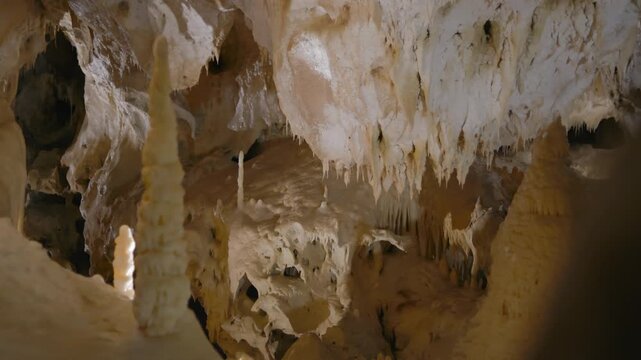 Frasassi Caves, rock formations inside the caves full of white calcite stalactites and stalagmites. Marche, Italy