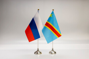 National flags of Russia and the Democratic Republic of the Congo on a light background. State flags.