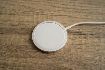 Wireless magnetic charger, modern equipment for mobile phone.