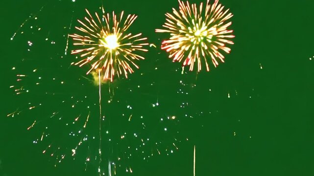 Abstract Firework on green Screen chroma key background, 4th of July independence day, New Year eve, Christmas 2024, Diwali Holiday concept. High quality 4k chromakey