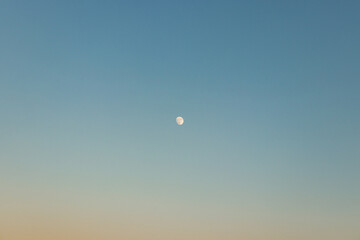shining full moon at sunset in Hersonissos, Crete