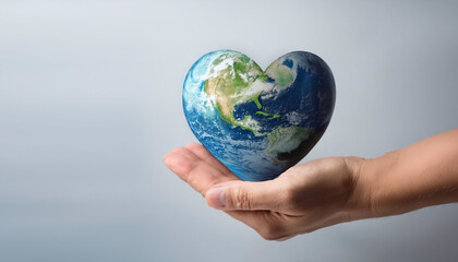 The heart-shaped earth in the hands of a person, on a clean and clear background, conveys a message of global unity. concept of International Day of Peace
