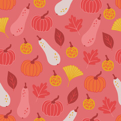 Autumn seamless pattern with pumpkins and leaves on pink background