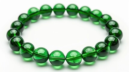 Green bead bracelet on white background