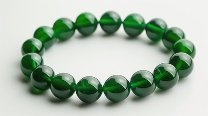 Green bead bracelet on white background
