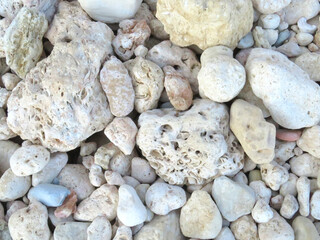 The texture of the white stones at the beach of the Atlantic Ocean